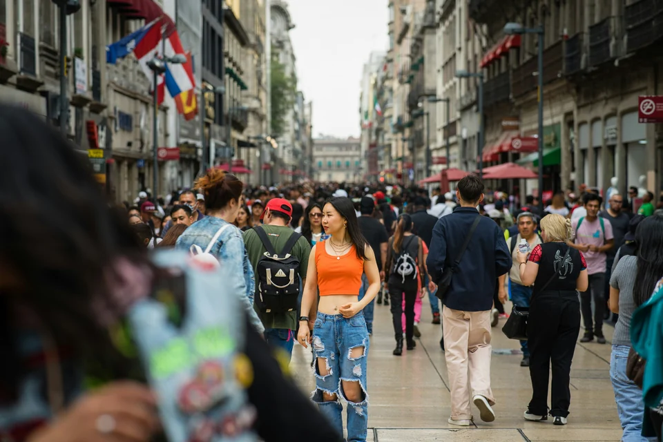 A travel photo can include people you did not mean to share.
